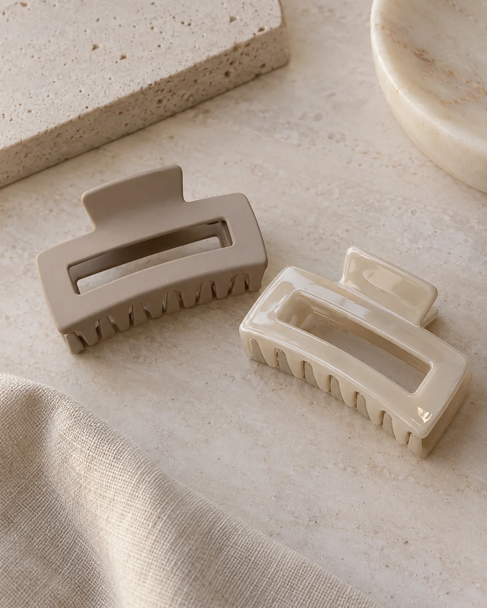 Compare Matte and Glossy Geometric Hair Clips — AI-generated editorial concept